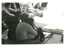Mother and child sitting and listening  during self-defence class at the Amazon Self-Defence and ...
