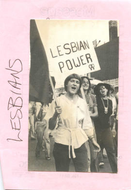 Close up of women demonstrators marching holding flags and  "Lesbian Power" sing during Body Poli...
