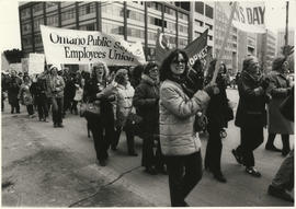 IWD march side view of women carrying Ontario Public Service Employees Union sign